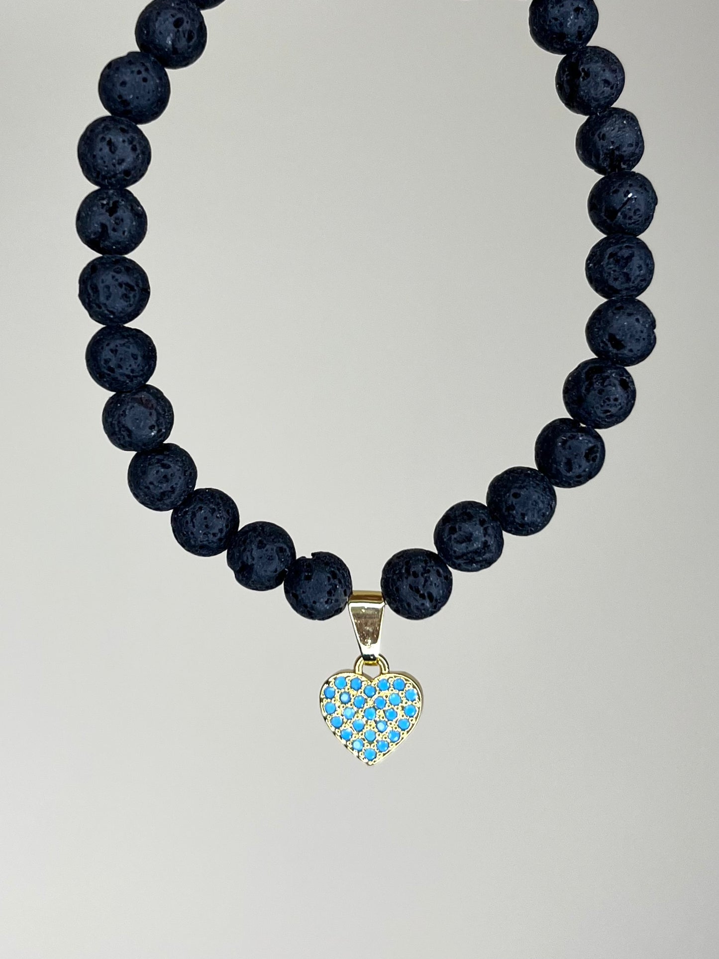 Black Lava Stretch Bracelet with Turquoise Heart Charm